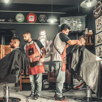 Corte de cabello y perfilado de barba de autor